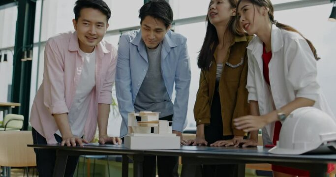 Brainstorming of small business people Structural Architect Design Presentation. Asian Startup group plan work with teamwork. cooperation of colleagues in Co-working Space. White collar&nbsp;