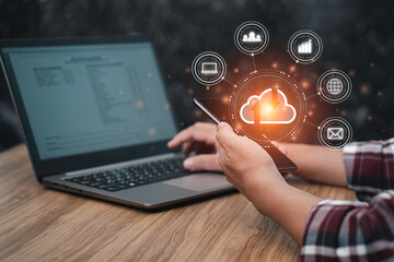 Man uses smartphones and laptops to work and transfer data via the Internet, businesses work online and technology that can work even at home