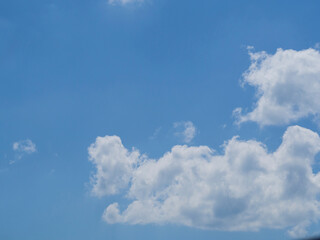 Naklejka na ściany i meble Beautiful white clouds in a blue sky. Sky and clouds. blue sky background with clouds