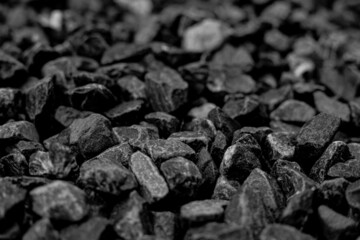 Natural black coals for background. Industrial coals.It can be used as a fuel for coal industry. Pea coal. Top view