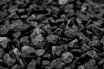 Natural black coals for background. Industrial coals.It can be used as a fuel for coal industry. Pea coal. Top view