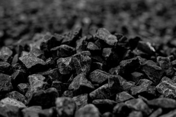 Natural black coals for background. Industrial coals.It can be used as a fuel for coal industry. Pea coal. Top view