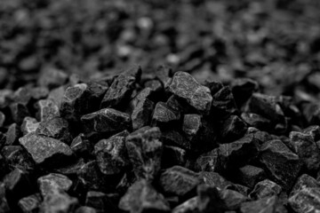 Natural black coals for background. Industrial coals.It can be used as a fuel for coal industry. Pea coal. Top view