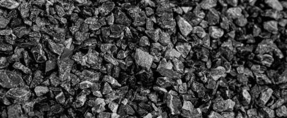 Natural black coals for background. Industrial coals.It can be used as a fuel for coal industry. Pea coal. Top view