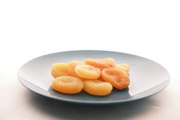 Apricot fruit half on wooden board on table 