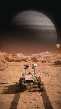 Footage of NASA's Mars rover traveling across the surface of Mars towards Jupiter