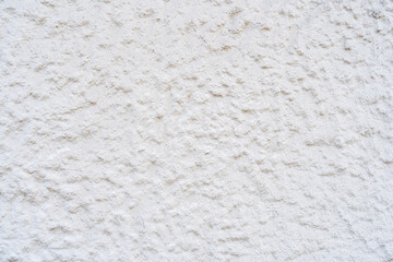 bright house plaster with a very coarse structure