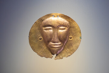 Bogota, Colombia, gold museum. A pre-Columbian artifact, an ornamental disc.