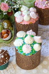 Obraz na płótnie Canvas Easter cakes decorated with meringue