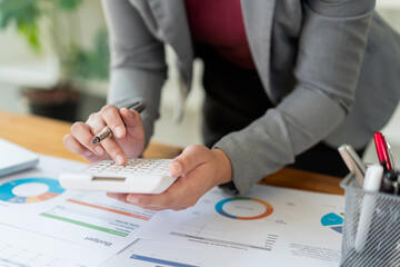 Business analyst concept the accountant calculating to estimate the amount of company’s expense