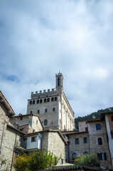 Naklejka premium View of the medieval village of Gubbio (Umbria, Central Italy). World famous as one the cities where lived St. Francis. In the background: the Consoli Palace.
