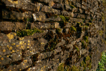 Old brick wall in vintage rusty-rough style for backgrounds and wallpapers. Italian fortress.