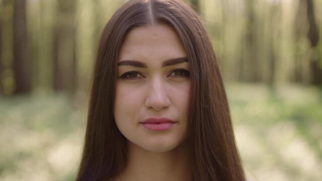 close up 4k shot of young beautiful Ukrainian woman in vyshyvanka  - ukrainian national clothes. Stand with Ukraine  