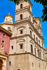 Fototapeta na wymiar Back facade of the Church of Santo Domingo in Murcia made of brick, with towers and arches