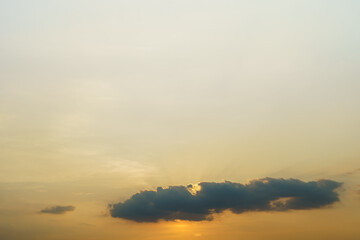 light yellow evening sky clouds background