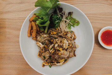 Pad See Ew is a stir-fried noodle dish that is commonly eaten in Thailand.