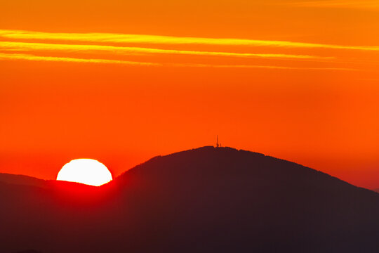 Colorful sunrise over the Schoeckl mountain near Graz in Austria
