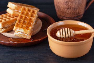 Breakfast with Belgian waffles, honey and coffee