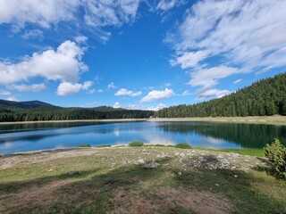 a beautiful landscape with a lake in the background in the mountains  near Blake lake in national park `durmitor` Montenegro. Unesco world heritage. Europe travel site. Vacation concept.  Tourism in a