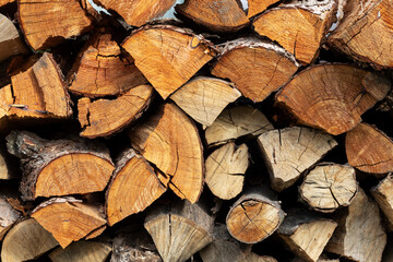 Chopped stacked firewood close up.