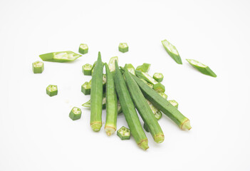 whole and pieces Lady Finger over on white background, selective focus