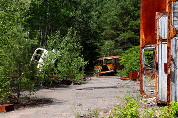 Rusty vehicles in the confination area of pripyat city, Chernobyl, Ukraine 