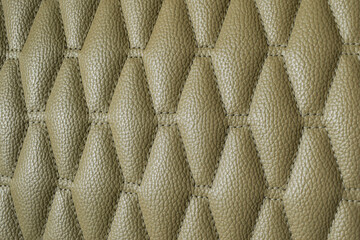Pure Leather background. Background of Car seat upholstery front seat with diamond shaped pattern textures. Couch sofa or chair seat cover stitched
