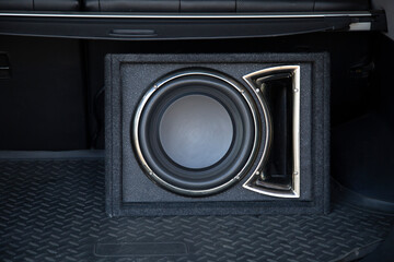 Car subwoofer in the car. Installing an active subwoofer in the car.