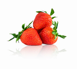 Three ripe strawberries isolated on white background. Fresh ripe strawberry close-up isolated on white background