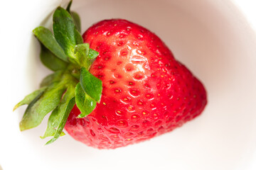 Closeup of fresh strawberry on white background