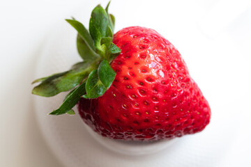 Closeup of fresh strawberry on white background