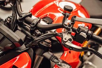 Papier Peint photo autocollant Moto Detail of the handlebar of a custom motorbike