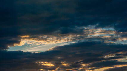 Dark skies at sunset in summer