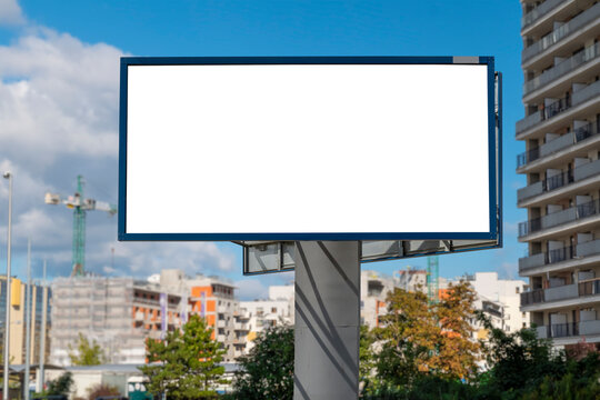 Advertising billboard mock-up on the residential area. There is construction site in the background