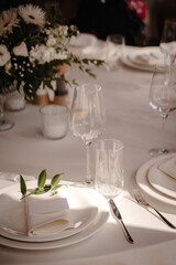 banquet table in restaurant with flowers decoration