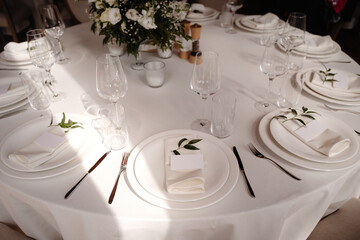 banquet table in restaurant with flowers decoration