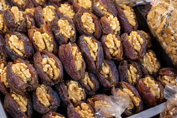 Turkish or arabic sweet dessert, ripe dried dadels with walnuts sweetened with syrup or honey.