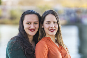 Obraz premium portrait of 2 lesbians embracing with great bokeh