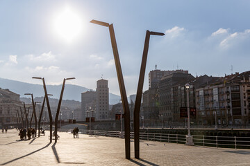 Bilbao, Spain - January 29, 2022: View of the promenade along the Nervion river.
