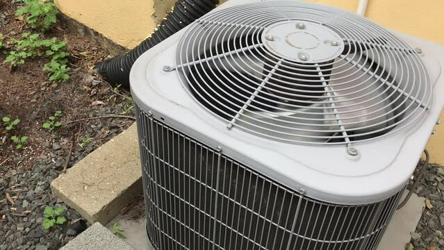 fan of air conditioning unit running in summer