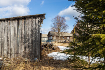 Fototapeta na wymiar Bolshaya Selga, Olonetsky district, Republic of Karelia, - April 28, 2022, an ancient Karelian village known since 1707. Wooden houses.