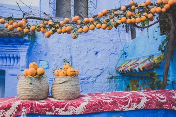 Keuken spatwand met foto Happy orange in blue city Chefchaouen © With Karim