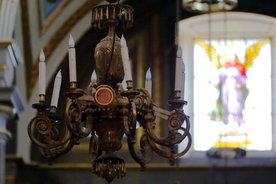 Ornate gilded baroque retablo altarpiece inside historic Mexican colonial church