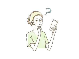 チューブボトルを見て疑問に思っている女性