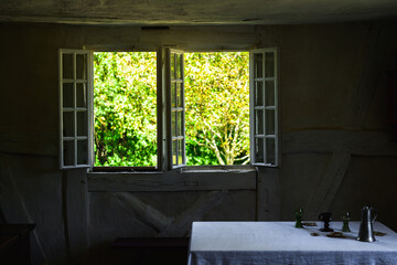 Frontier house with light coming in windows