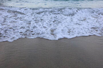 Soft blue ocean wave on the beach and soft wave background.