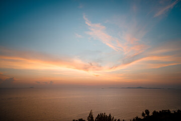 sunset over the sea and sunset seaside and orange clouds
