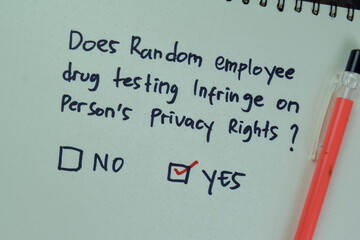 Concept of Does random employee drug testing infringe on person's privacy rights write on a book isolated on Wooden Table.