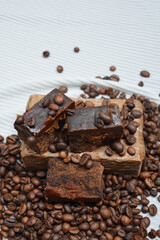 Cubes of brown sugar and coffee beans from Riau Province of Indonesia