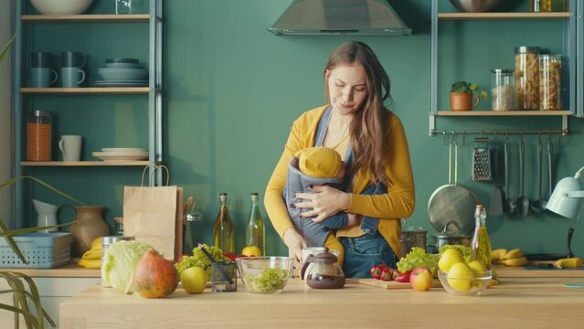 Tired Mom Soothes The Child On The Hands Drinks Coffe.Housewife Multitasking At Home With Her Newborn Baby.Stressed Woman Looking Worried, Tired And Overwhelmed.Tired Woman With Kid